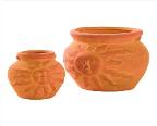 a pair of graceful urn-shaped planters; bas-relief sun at the front of each flowerpot.